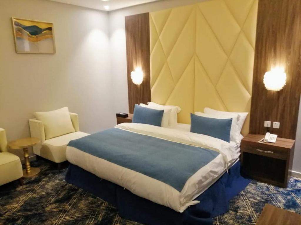 En eller flere senge i et værelse på فندق ايديا
