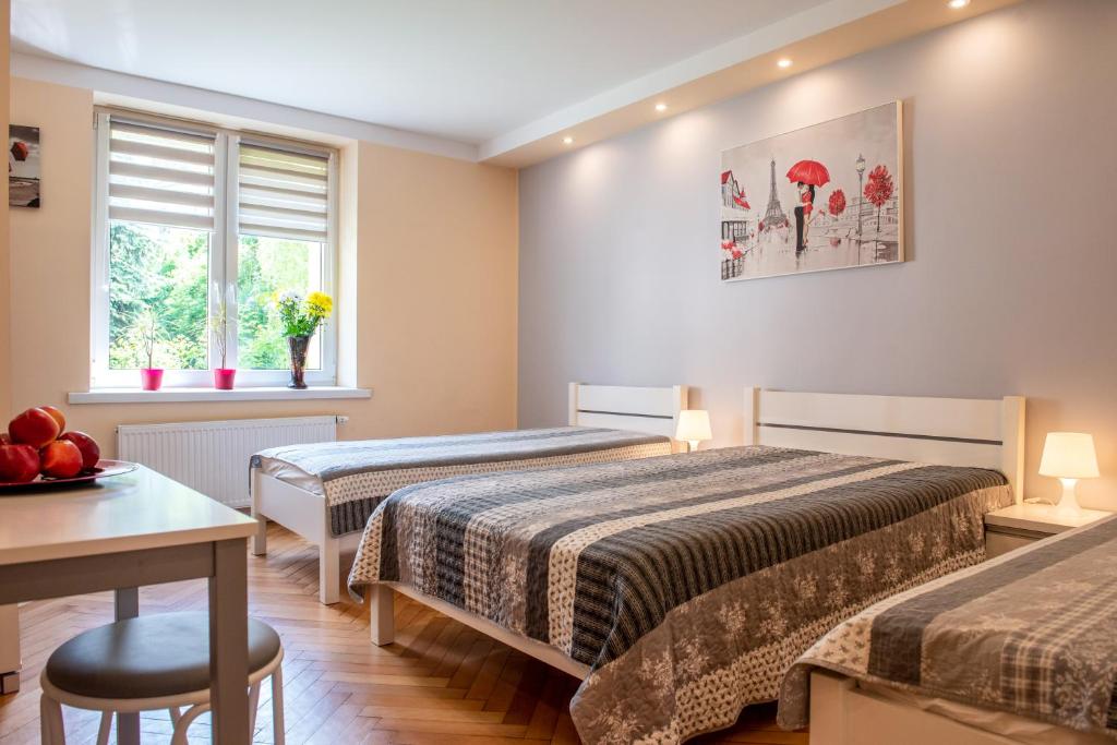 Posteľ alebo postele v izbe v ubytovaní Apartament u Janka