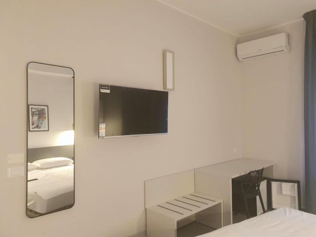 Postel nebo postele na pokoji v ubytování Charme Rooms Siracusa