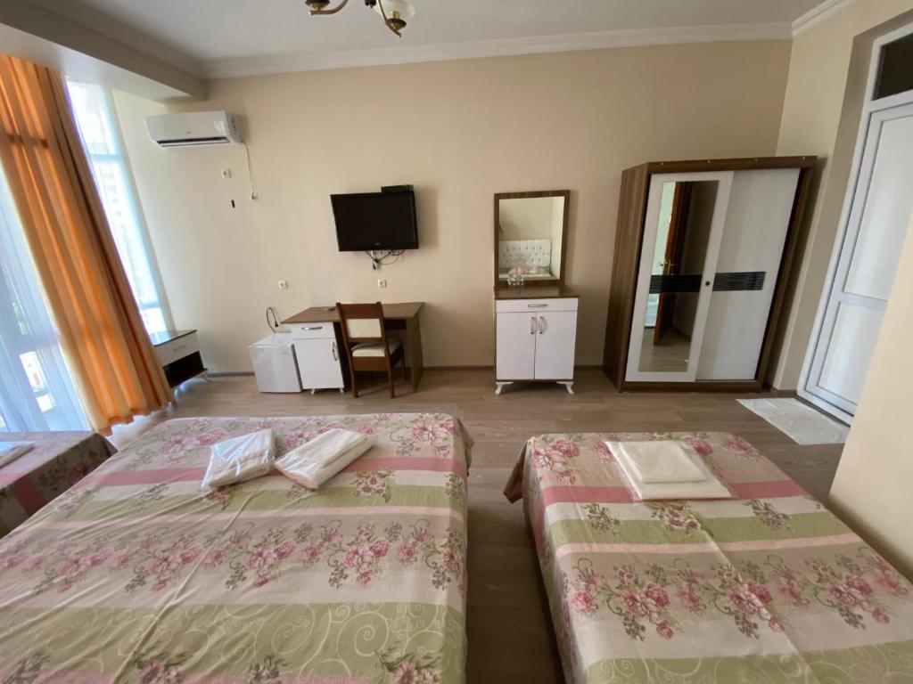 Postel nebo postele na pokoji v ubytování Hotel Eurasia