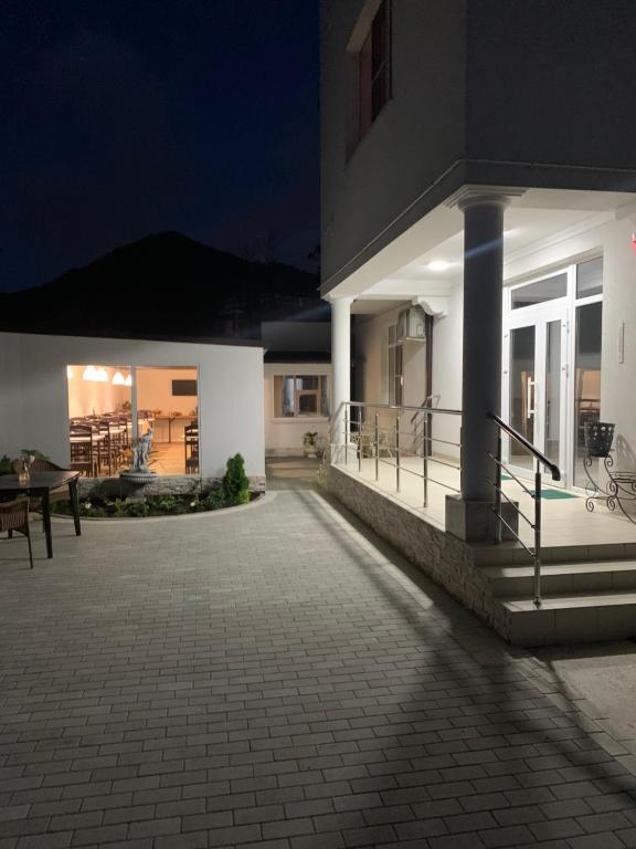 a night view of a house with a patio at FamilyStories in Agoy