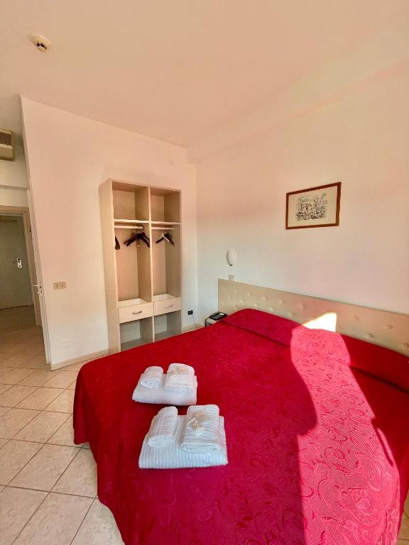 Postel nebo postele na pokoji v ubytování Hotel Blumen