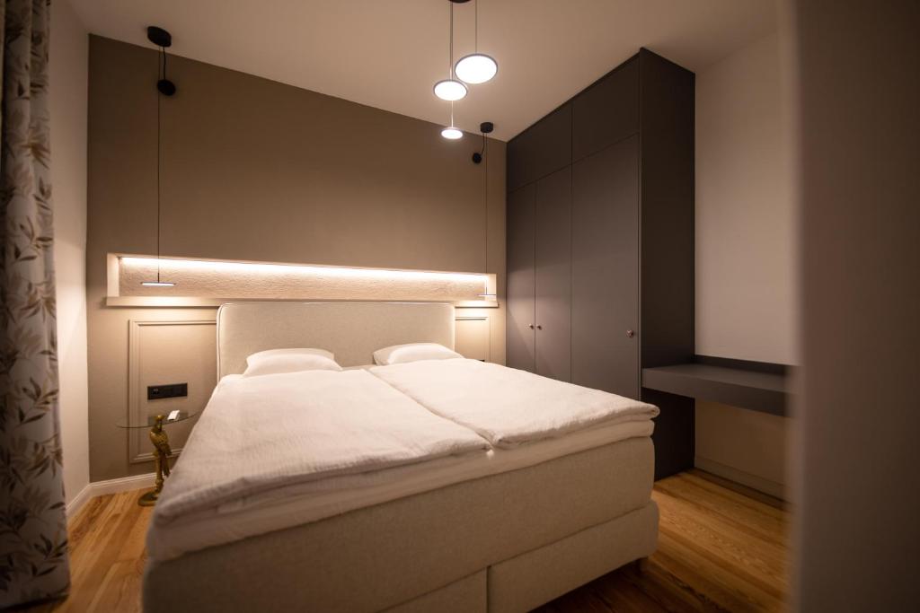 Letto o letti in una camera di Arbostora Charme Hotel