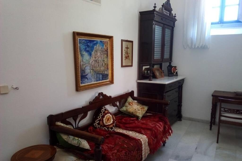 Posteľ alebo postele v izbe v ubytovaní NAXOS CASTLE HOUSE