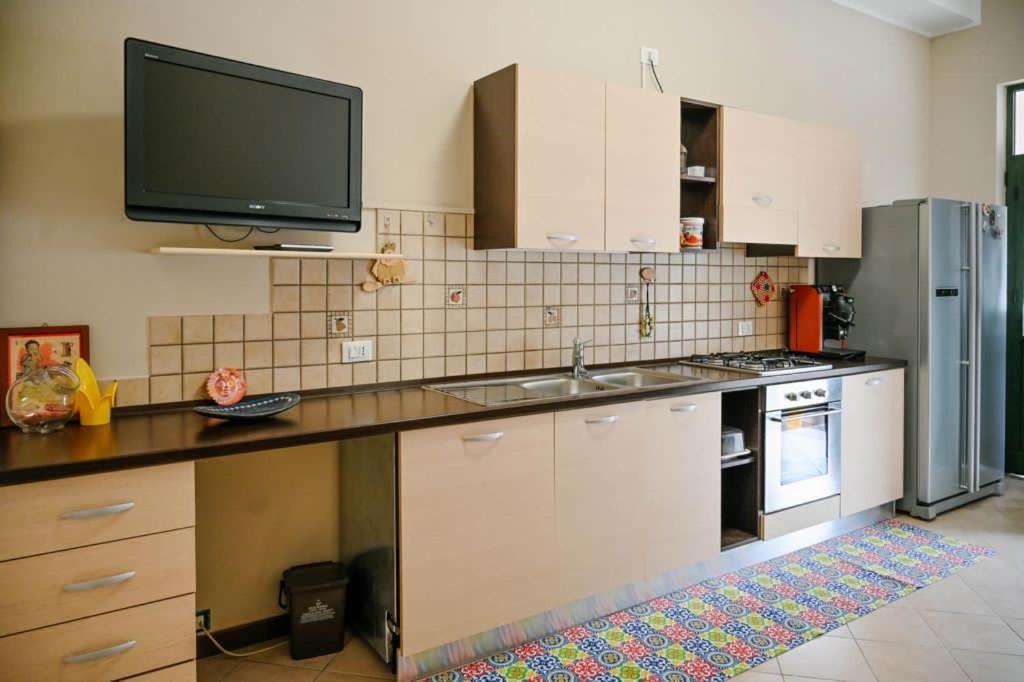 Kuchyň nebo kuchyňský kout v ubytování Stella del Sud