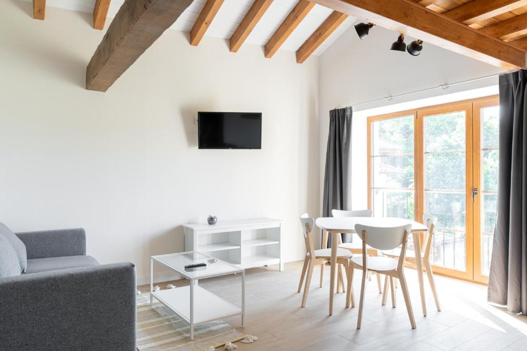 TV a/nebo společenská místnost v ubytování Jardines Villaverde