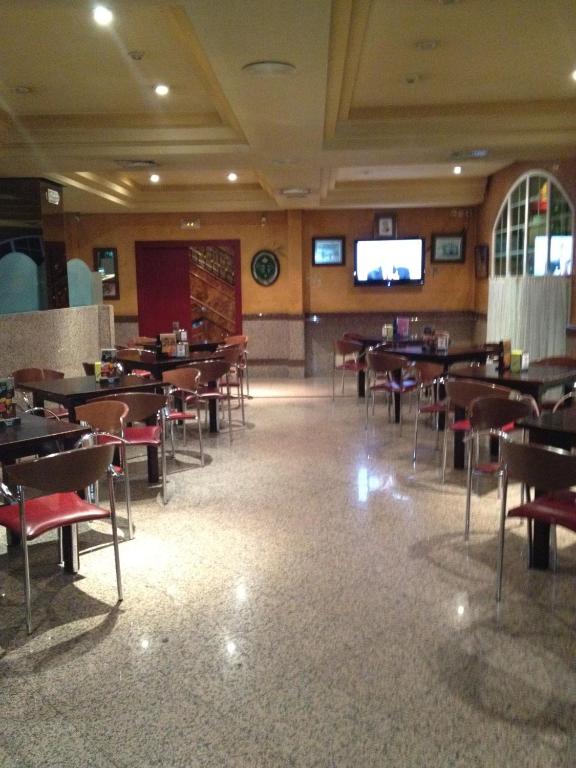 A restaurant or other place to eat at Hotel Don Angel
