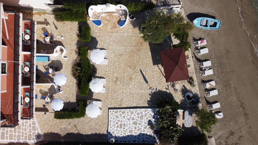 an overhead view of a parking lot with parked cars at Alisaxni Studios in Argassi