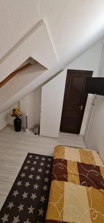Postel nebo postele na pokoji v ubytování Arató Vendégház