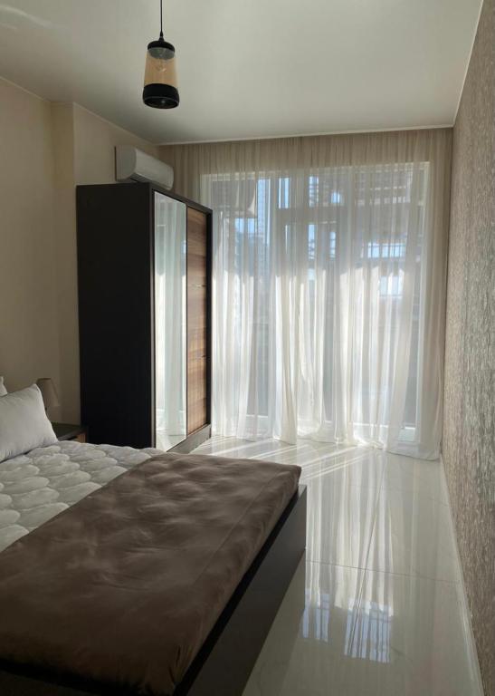 Postel nebo postele na pokoji v ubytování Horizons Hotel Rooms