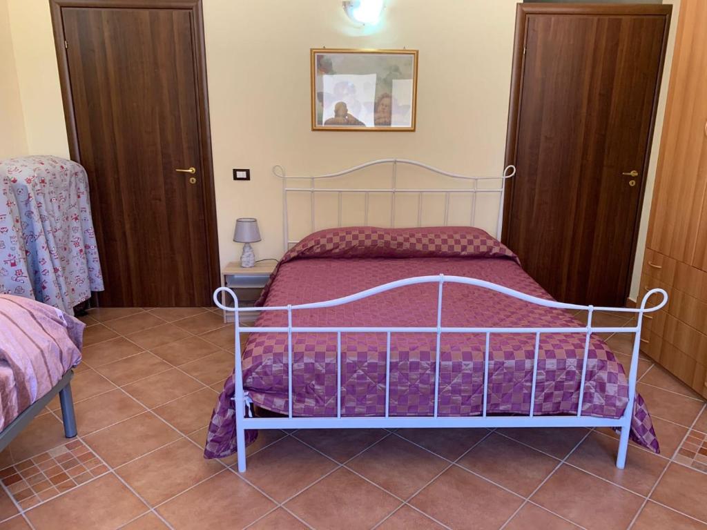 Postel nebo postele na pokoji v ubytování Appartamenti Siculiana