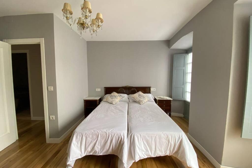 Postel nebo postele na pokoji v ubytování El Taller de Doña Remedios