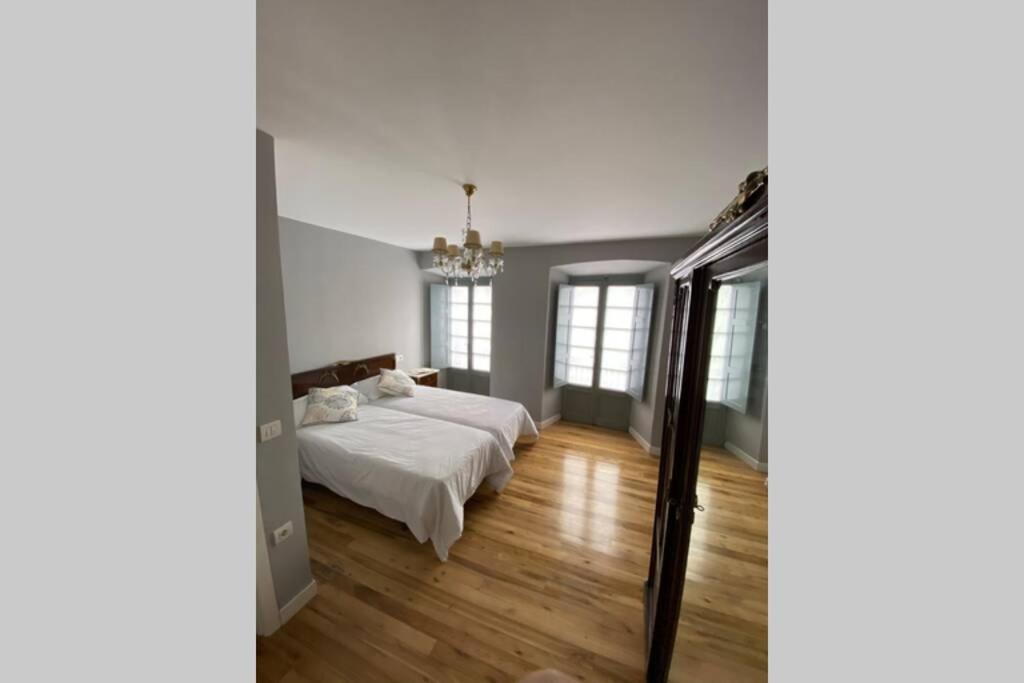 Postel nebo postele na pokoji v ubytování El Taller de Doña Remedios
