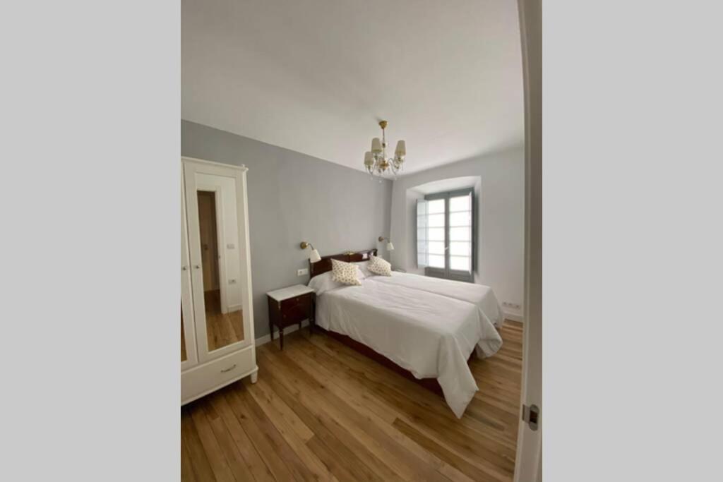 Postel nebo postele na pokoji v ubytování El Taller de Doña Remedios