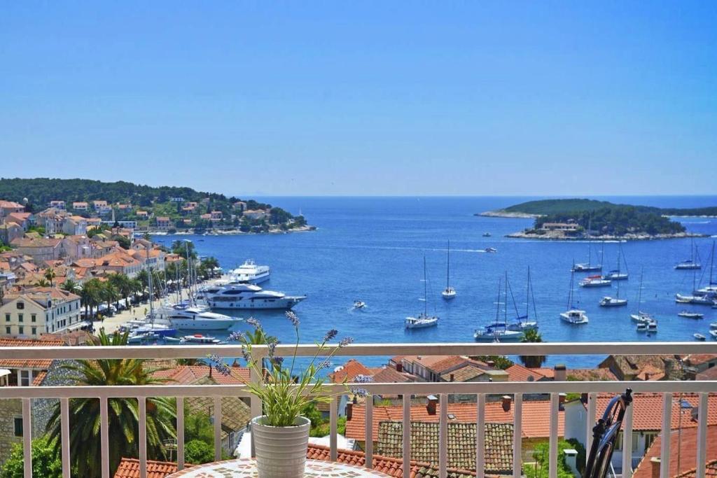 a view of a harbor with boats in the water at Anatota Hvar in Hvar
