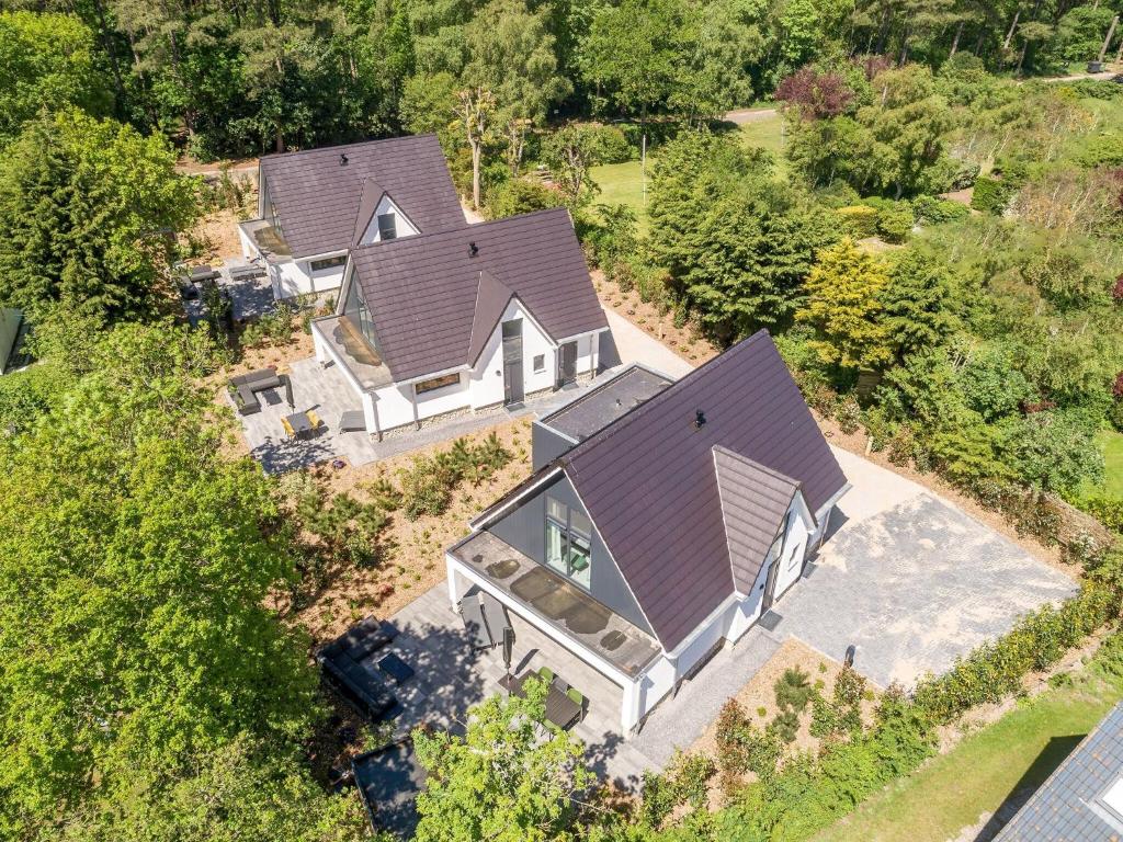an overhead view of a house with a roof at Villa in Texel near Beach and Nature Reserve in Den Burg