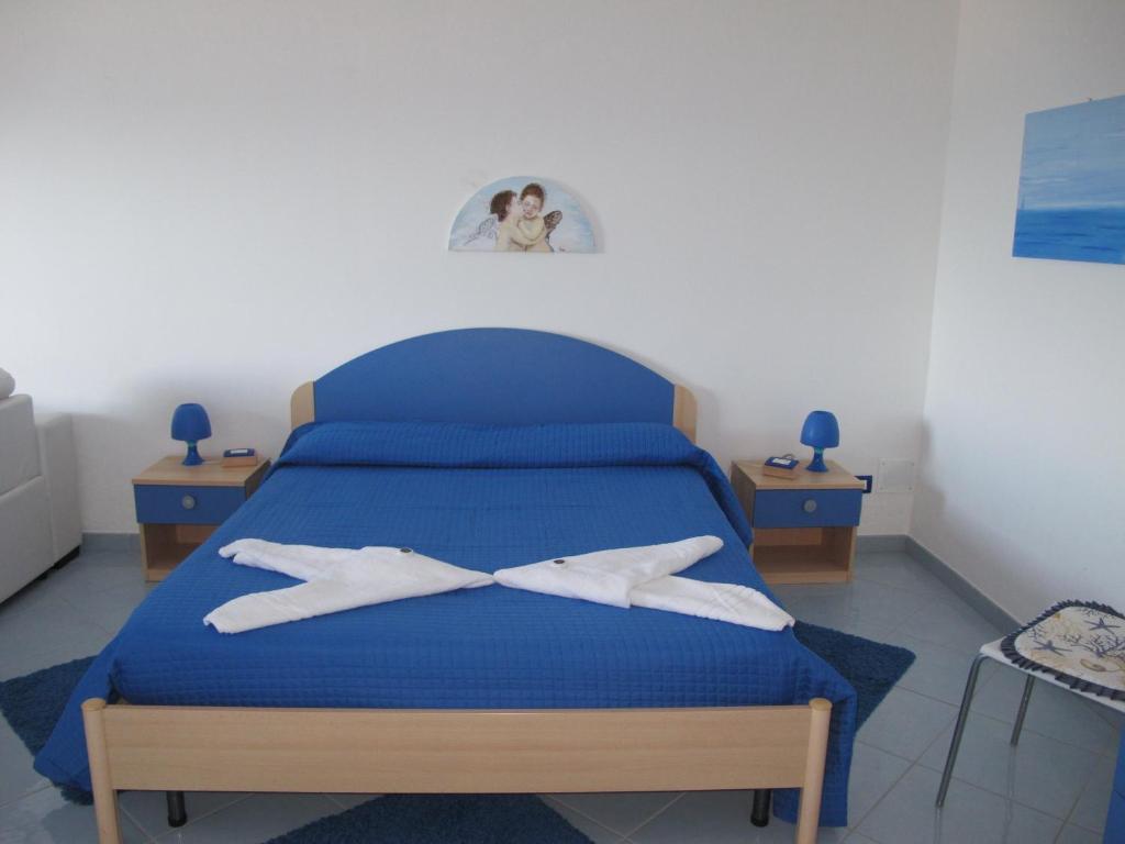Postel nebo postele na pokoji v ubytování Miramare