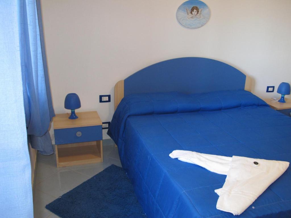 Postel nebo postele na pokoji v ubytování Miramare