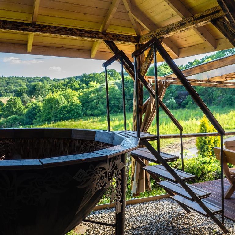 Balkón alebo terasa v ubytovaní Willa Sulimówka - Noclegi Zakliczyn dom basen bania sauna SPA