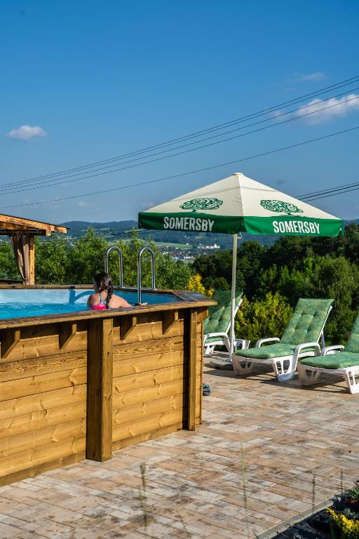Bazén v ubytovaní Willa Sulimówka - Noclegi Zakliczyn dom basen bania sauna SPA alebo v jeho blízkosti