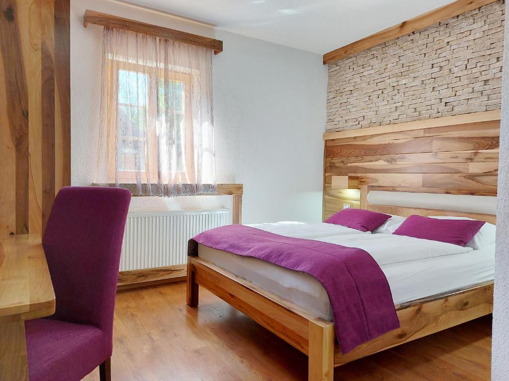 Voodi või voodid majutusasutuse Plitvice Ethno House toas