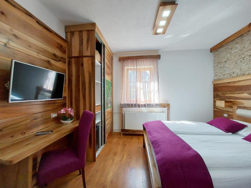 Voodi või voodid majutusasutuse Plitvice Ethno House toas