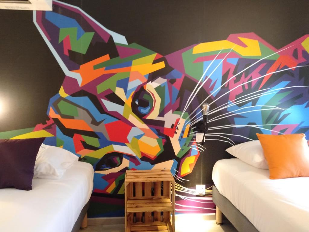 Postel nebo postele na pokoji v ubytování Urban Style Arl HOTEL