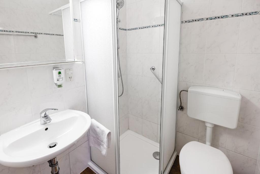 Koupelna v ubytování Hotel Hoffinger