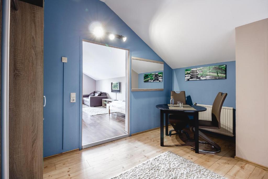 TV a/nebo společenská místnost v ubytování Hotel Hoffinger