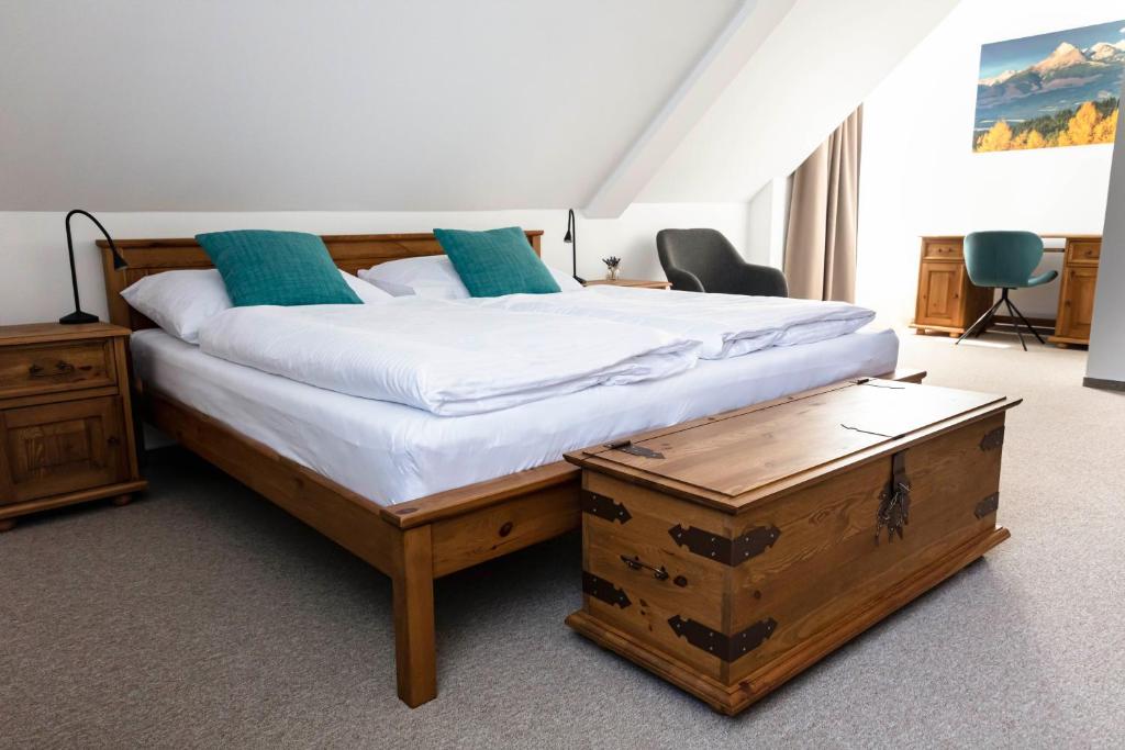 A bed or beds in a room at Chalet Nova Lesna Mountain View