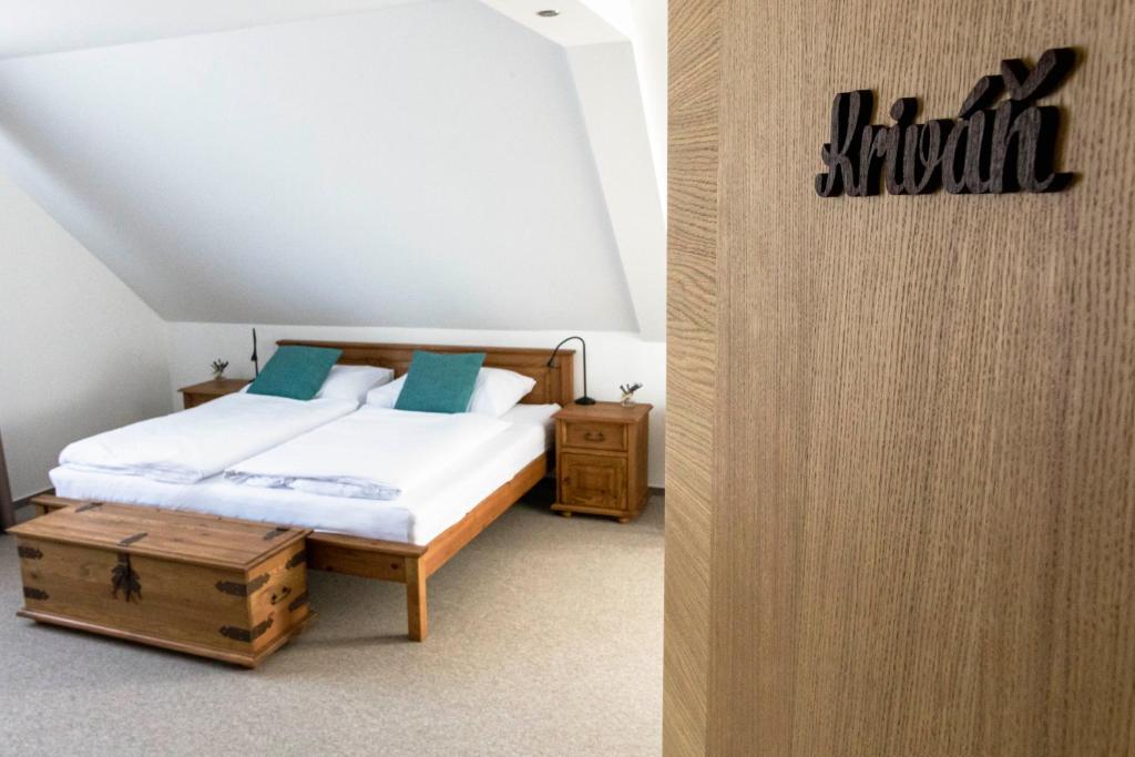 A bed or beds in a room at Chalet Nova Lesna Mountain View