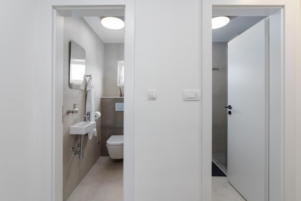 Kúpeľňa v ubytovaní Ampelea apartment