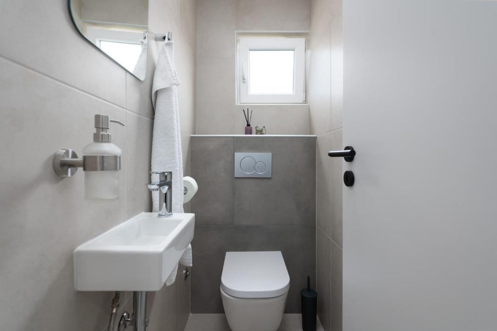 Kúpeľňa v ubytovaní Ampelea apartment