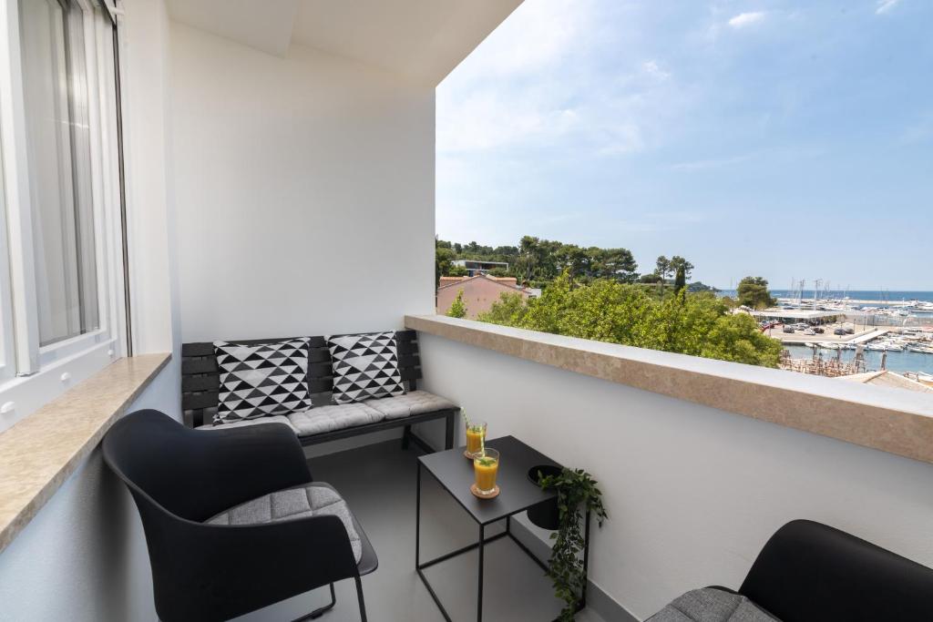 Balkón alebo terasa v ubytovaní Ampelea apartment