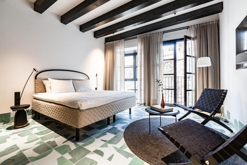 Posteľ alebo postele v izbe v ubytovaní Concepcio by Nobis, Palma, a Member of Design Hotels