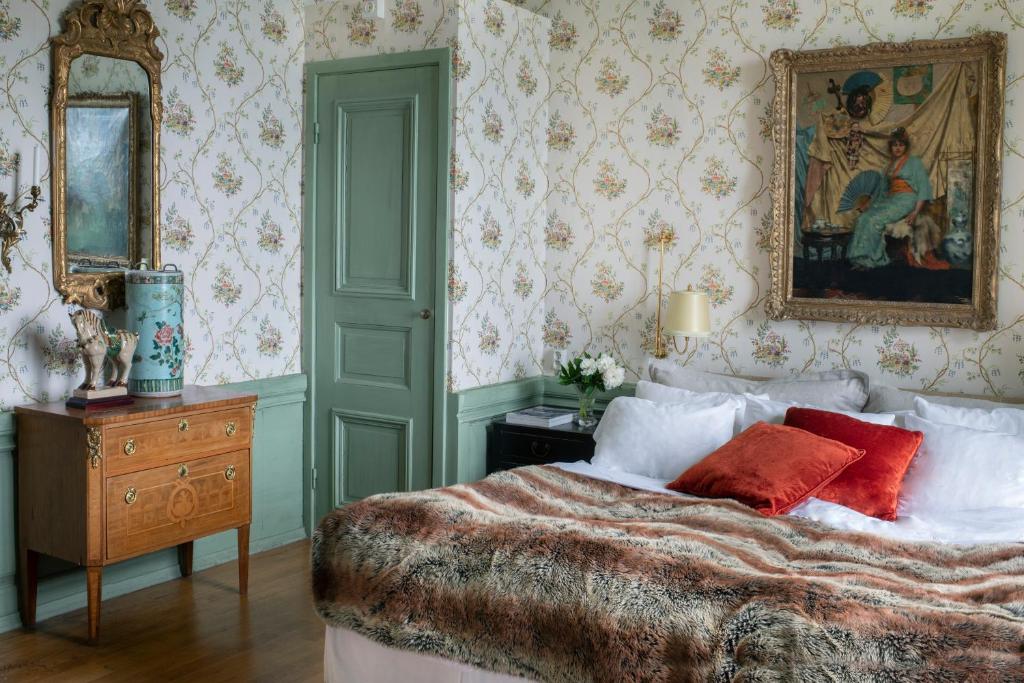 Postel nebo postele na pokoji v ubytování Västanå Slott