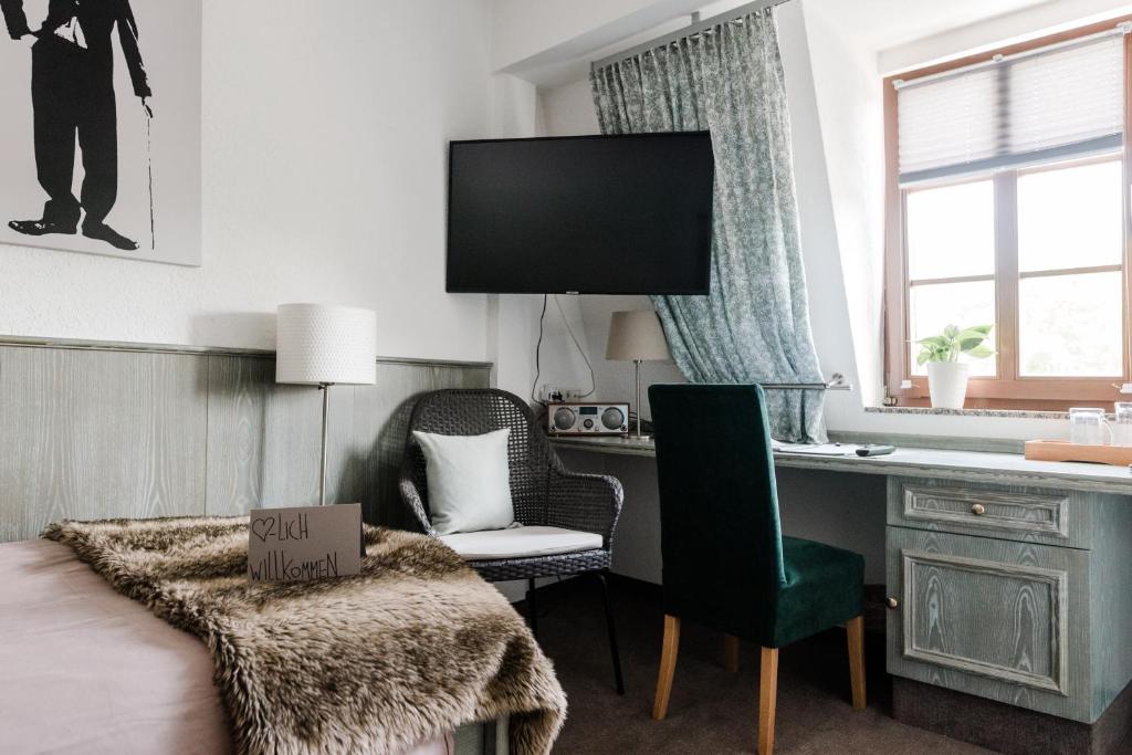 Kuchyň nebo kuchyňský kout v ubytování Sommers Hotel Altes Posteck