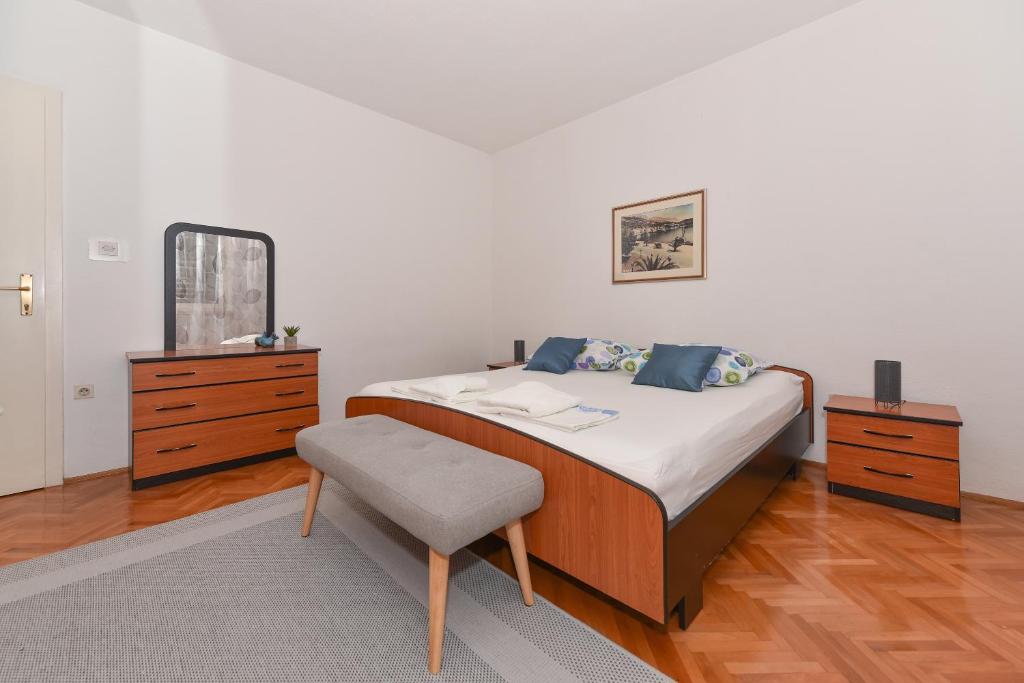 Posteľ alebo postele v izbe v ubytovaní Apartman Moga Dida