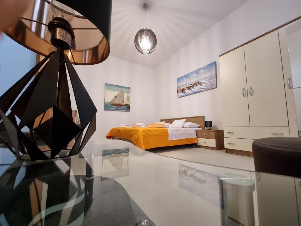 Posteľ alebo postele v izbe v ubytovaní Studio Apartment Mandic