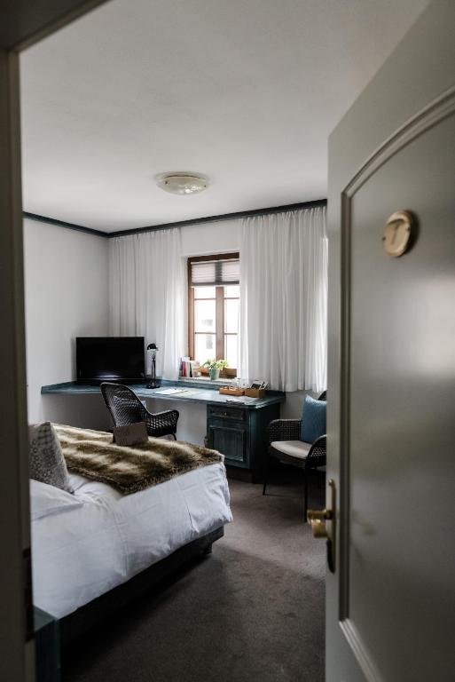 Postel nebo postele na pokoji v ubytování Sommers Hotel Altes Posteck