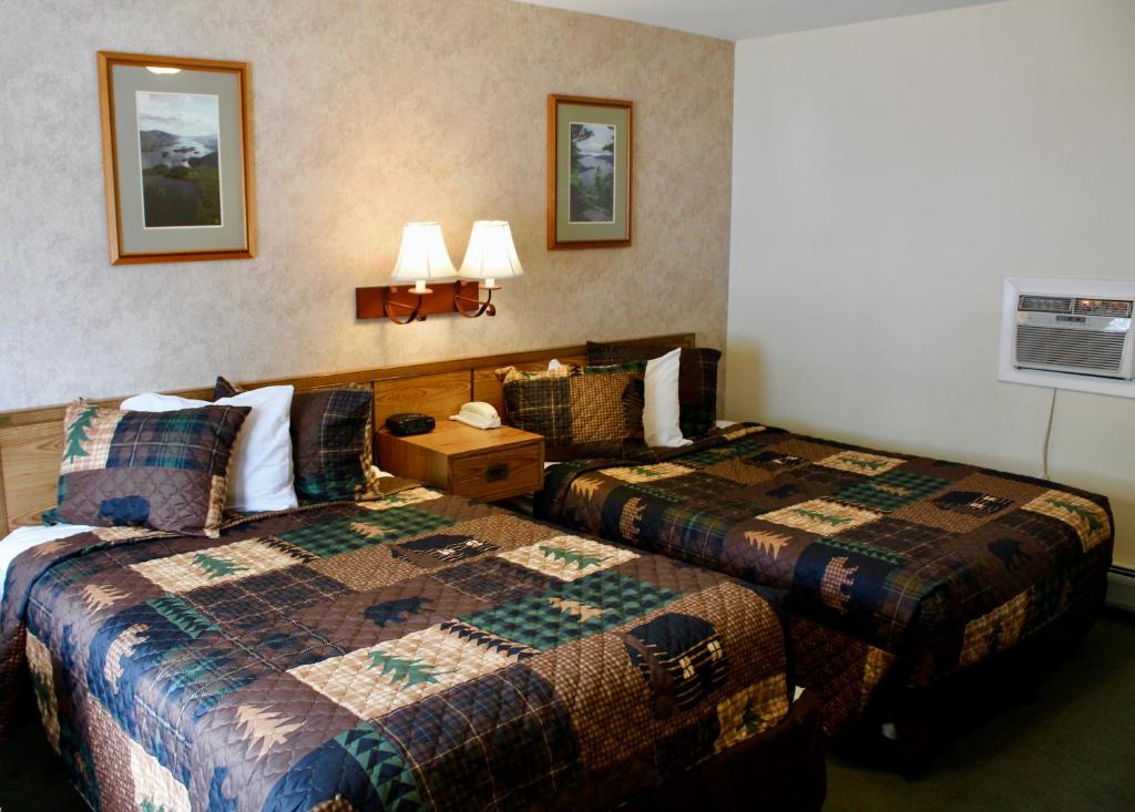 Postel nebo postele na pokoji v ubytování Lake Haven Motel