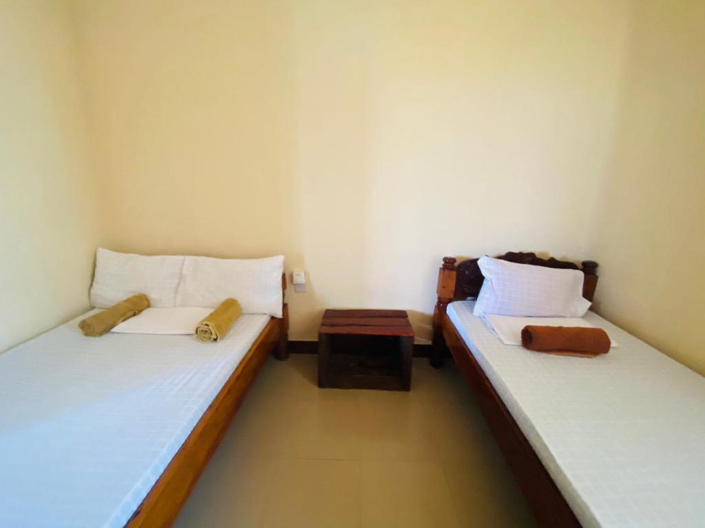 Postel nebo postele na pokoji v ubytování Village View Hostel