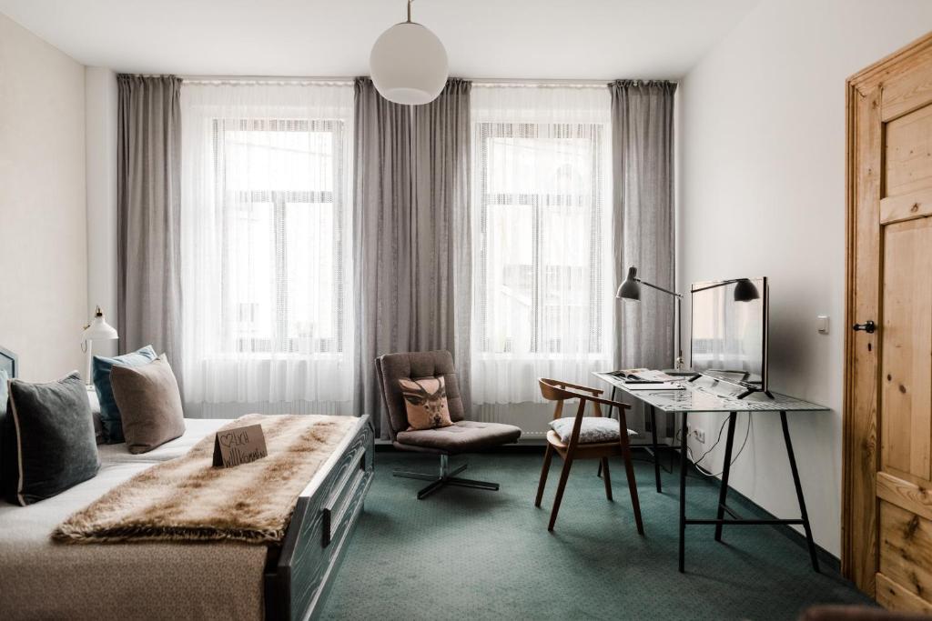 Postel nebo postele na pokoji v ubytování Sommers Hotel Altes Posteck