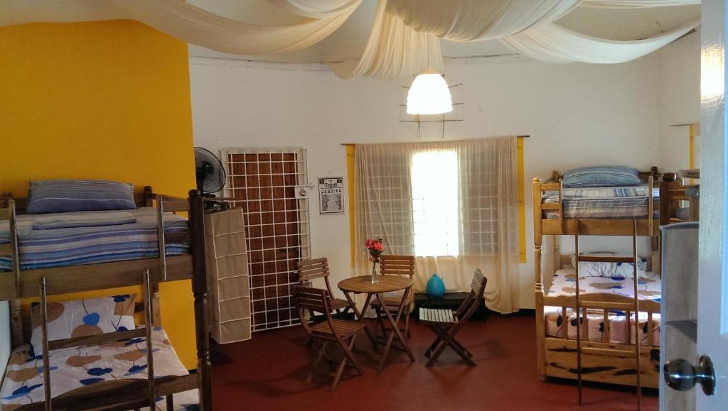 Postel nebo postele na pokoji v ubytování Germaican Hostel