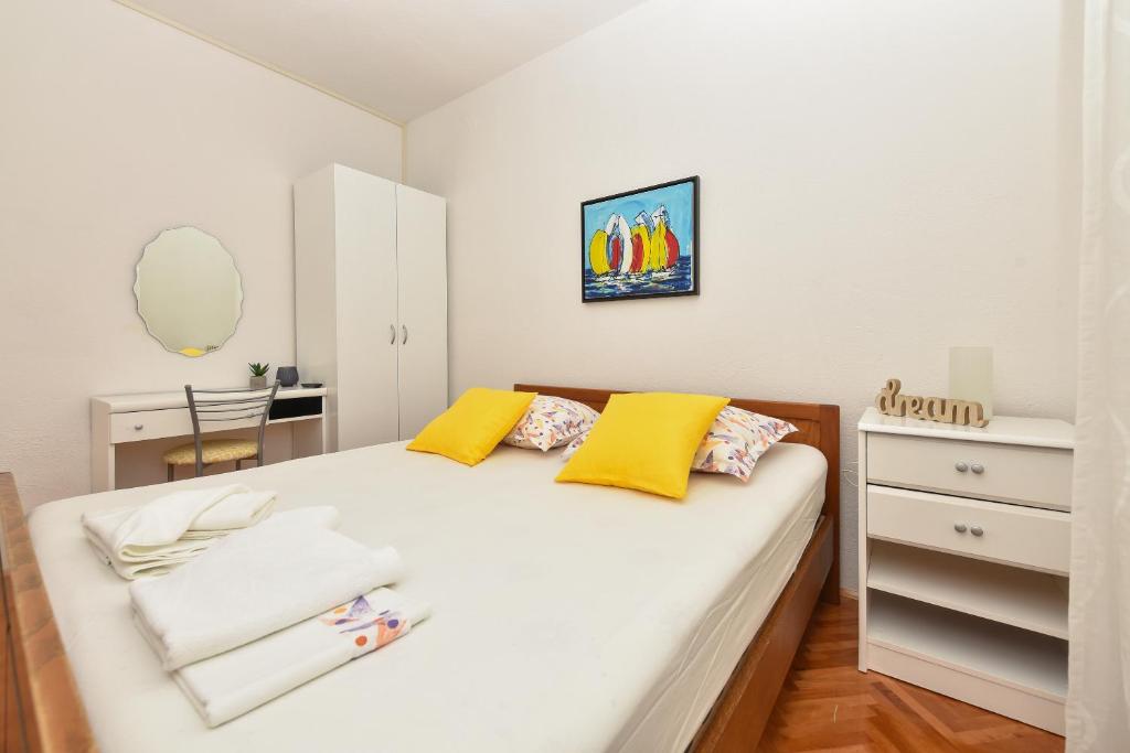 Posteľ alebo postele v izbe v ubytovaní Apartman Moga Dida