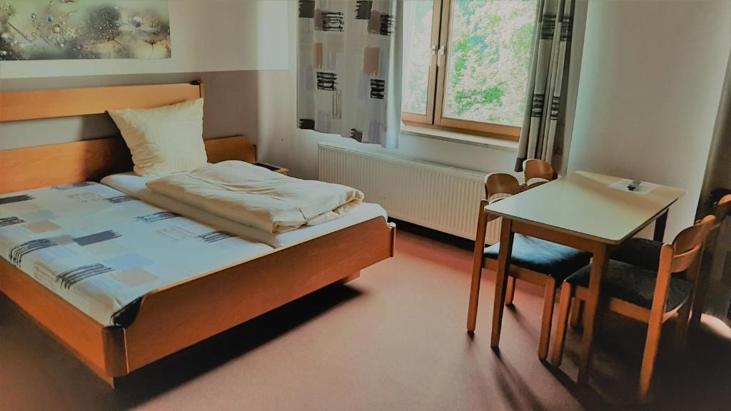 Postel nebo postele na pokoji v ubytování Landgasthof Schwarz
