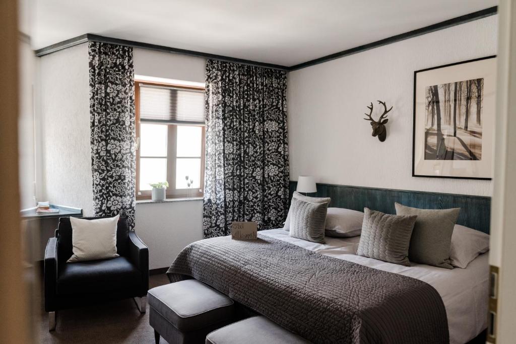 Postel nebo postele na pokoji v ubytování Sommers Hotel Altes Posteck
