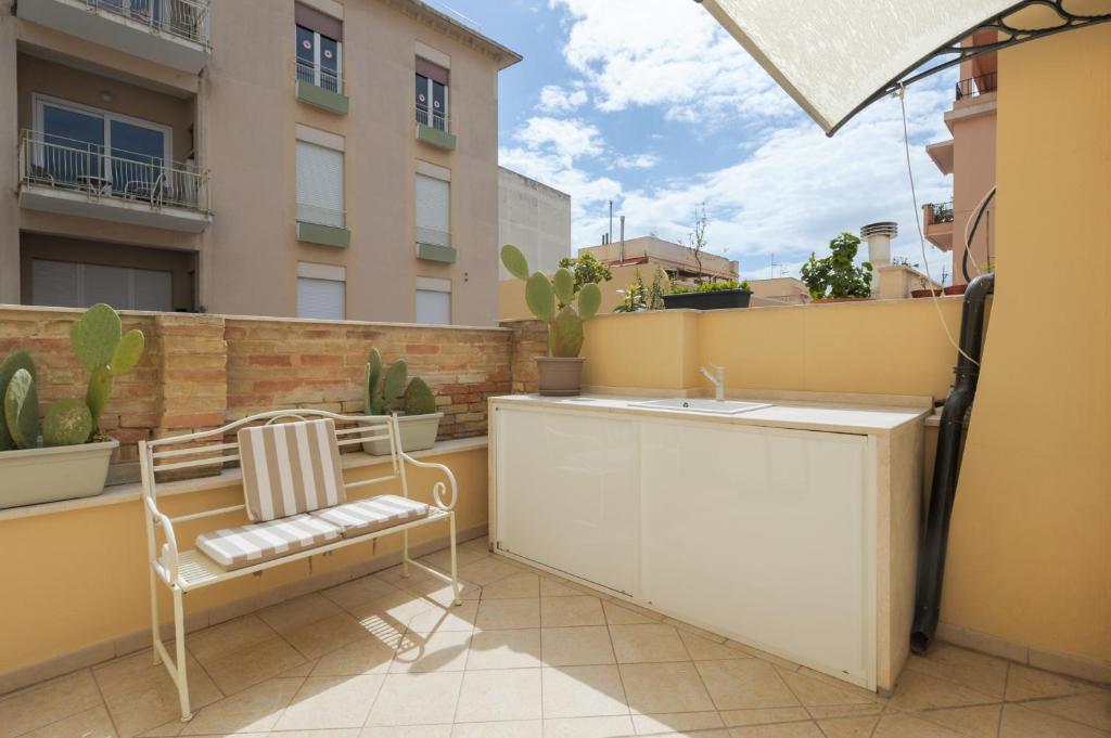 A balcony or terrace at A Gem in the City