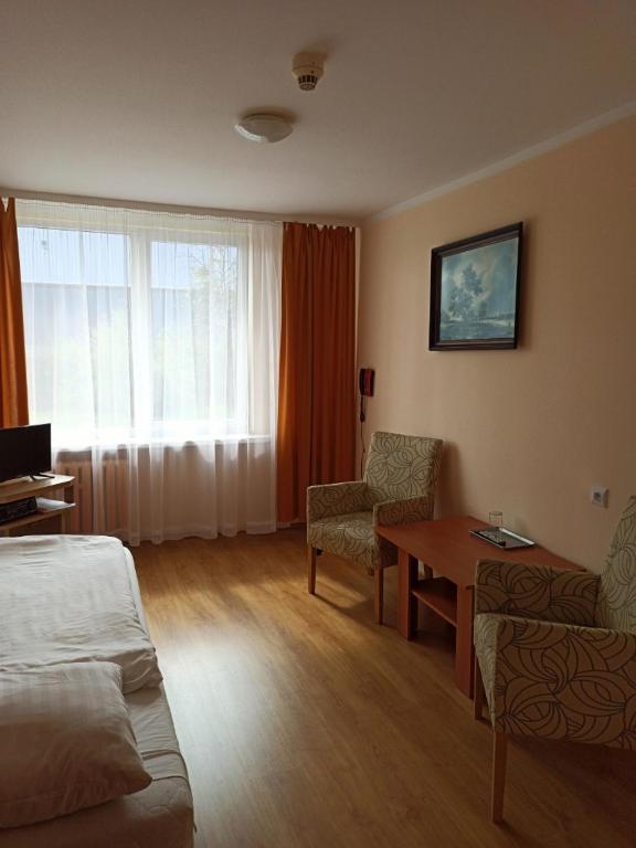 TV a/nebo společenská místnost v ubytování Hotel Słupsk