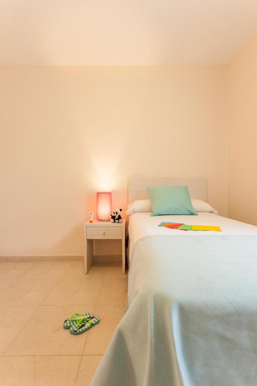 Postel nebo postele na pokoji v ubytování Pierre & Vacances Salou